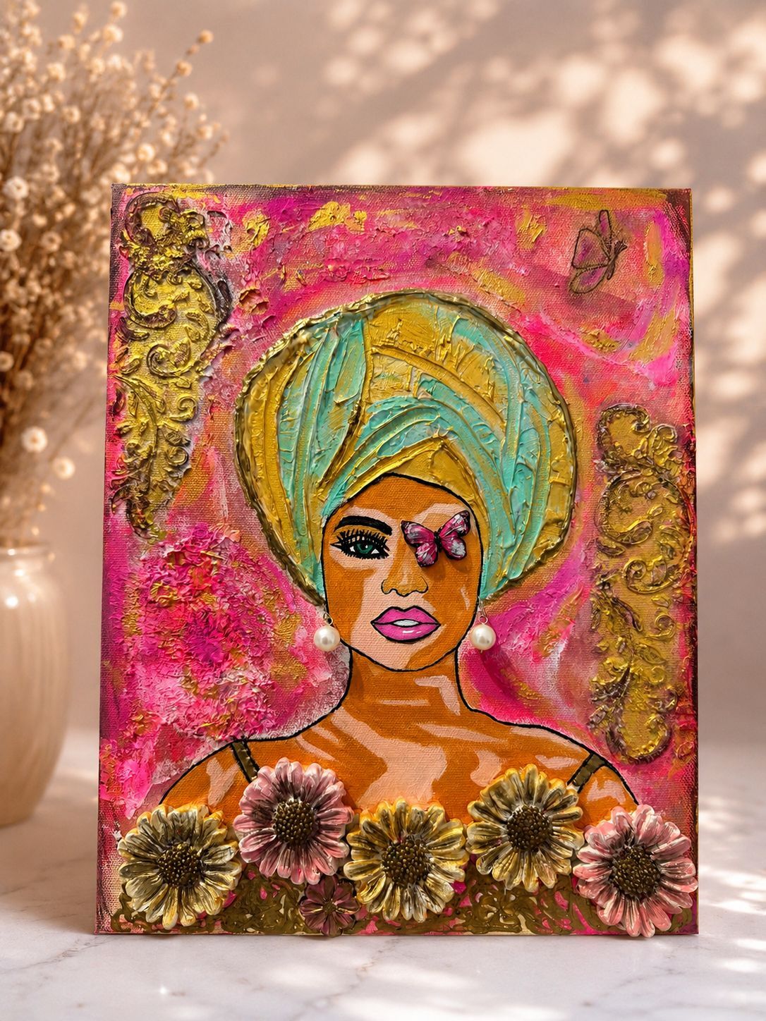 Blooming in Every Shade — mixed-media portrait of a woman crowned in a teal-and-gold turban, a butterfly resting at her eye
